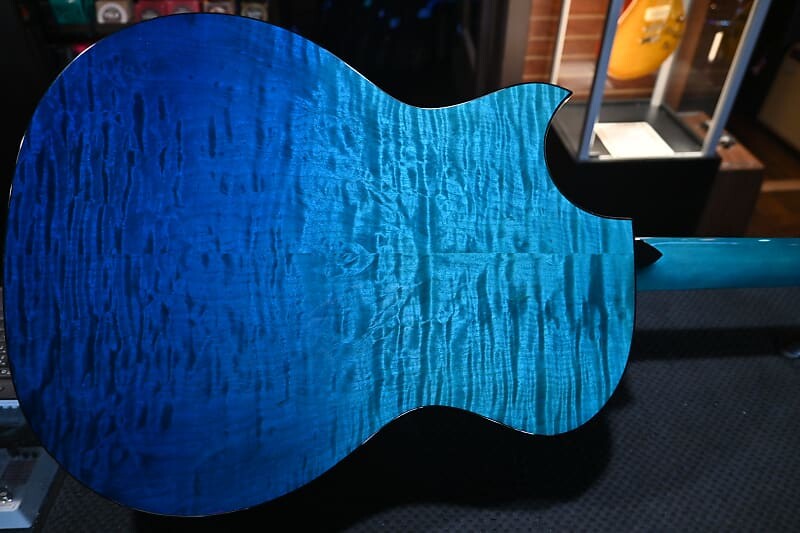 

Акустическая гитара Taylor Custom GA Grand Auditorium Spruce/Big Leaf Maple Catch #10 - Caribbean Fade #3121