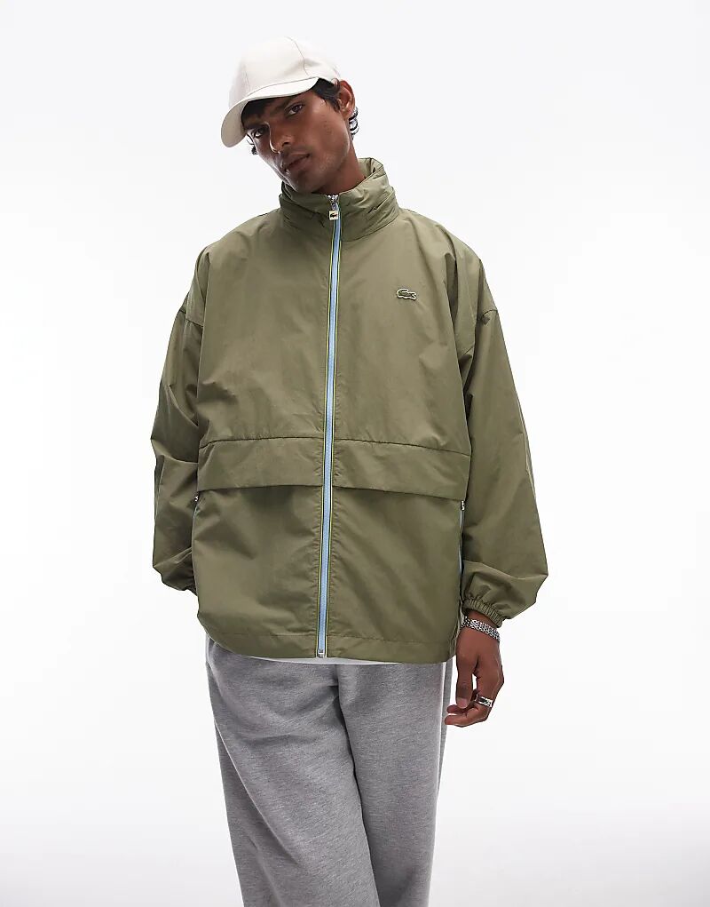 

Спортивная куртка на молнии цвета хаки Lacoste