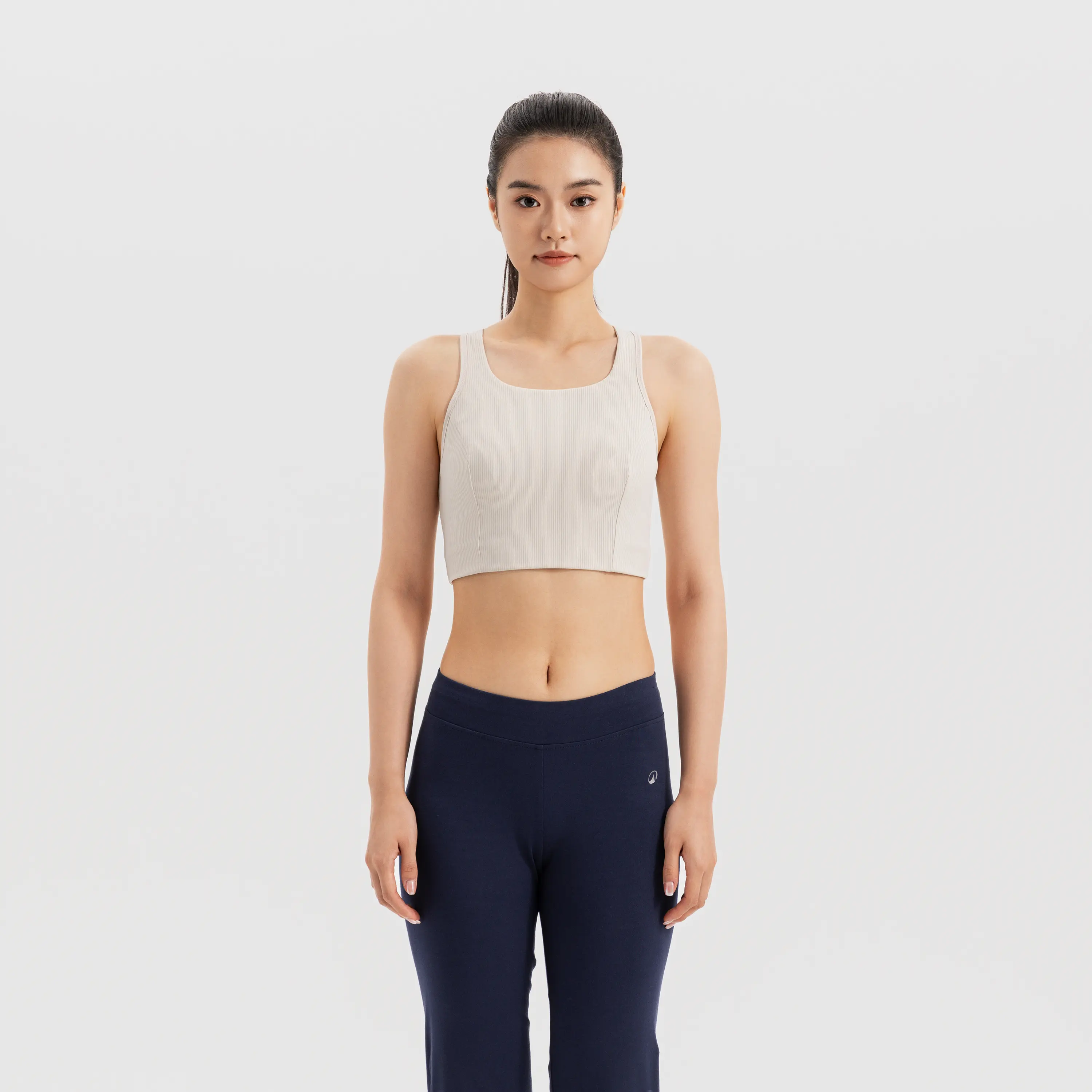 

Женская удлинённая спортивная майка Decathlon для средних нагрузок с открытой спиной