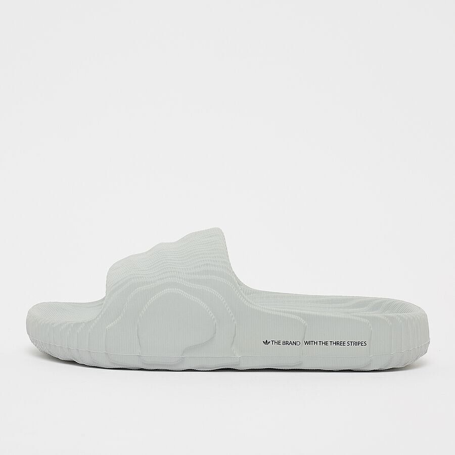 

Шлепанцы adilette 22 Badelatschen adidas Originals, цвет clear grey/clear grey/clear grey