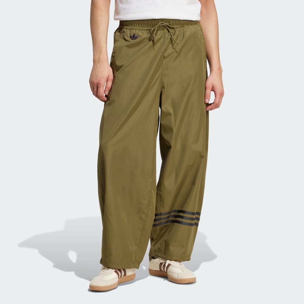 

Спортивный костюм Adidas Neuclassics Track Pant, цвет Focus Olive