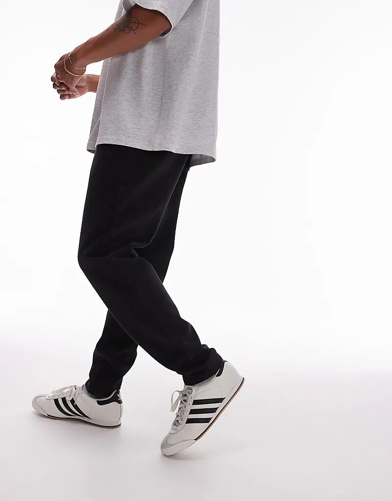 

Зауженные брюки с эластичным поясом черного цвета Topman