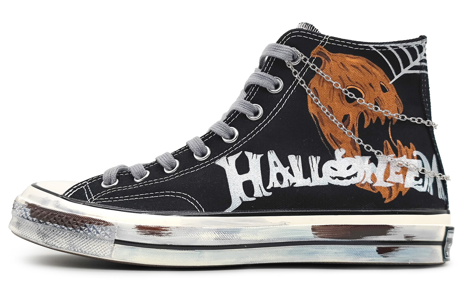 

1970-е годы. Кеды унисекс с высоким берцем, белые/оранжевые. Converse