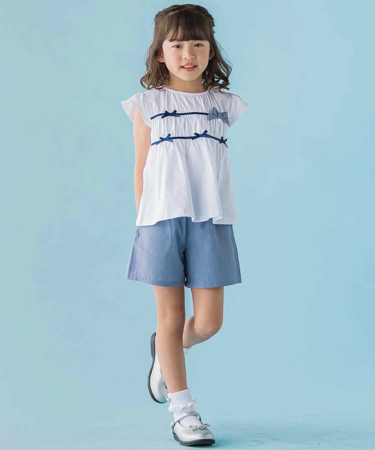 Детский комплект: топ с рюшами и бантом + юбка-шорты, BeBe Petits Pois Vert, 95-150 см, розовый — фото 4