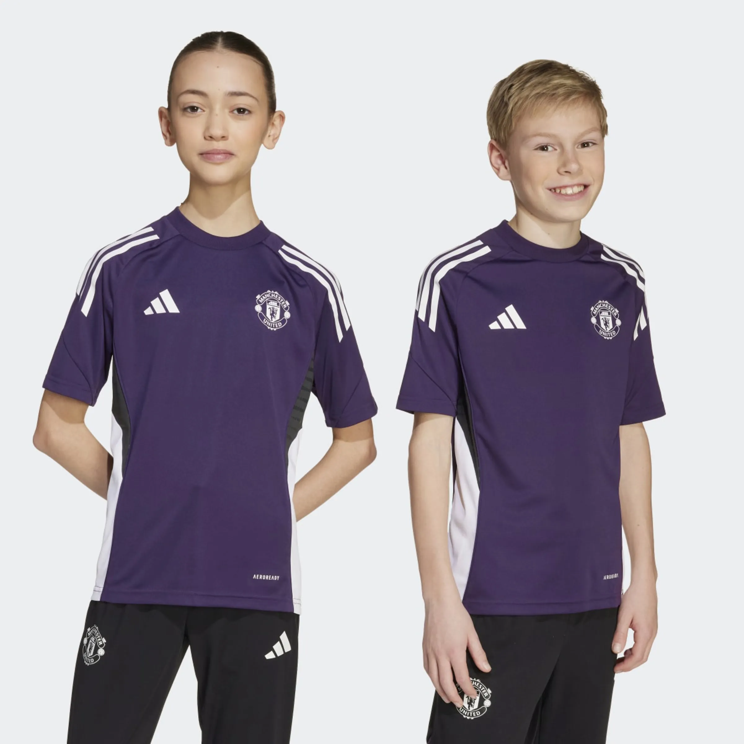 

Детская футболка Manchester United FC 2025-2026 Tiro Competition Adidas, фиолетовый