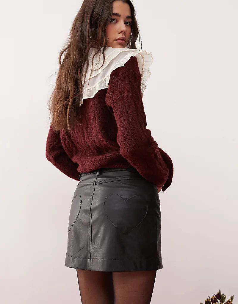 

Мини-юбка из искусственной кожи с карманом в форме сердца Miss Selfridge