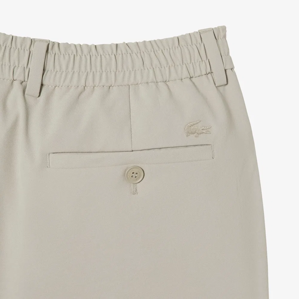 Мужские лёгкие брюки бежевого цвета от Lacoste — фото 4