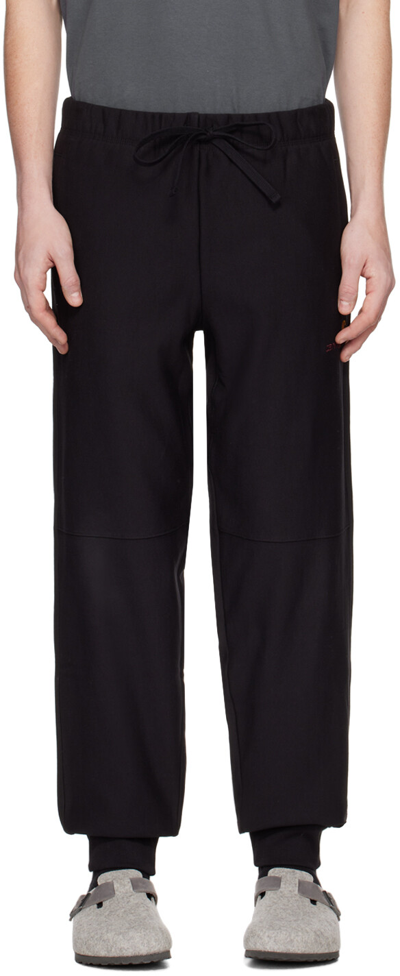 

Черные спортивные штаны с американским рисунком Carhartt Work In Progress