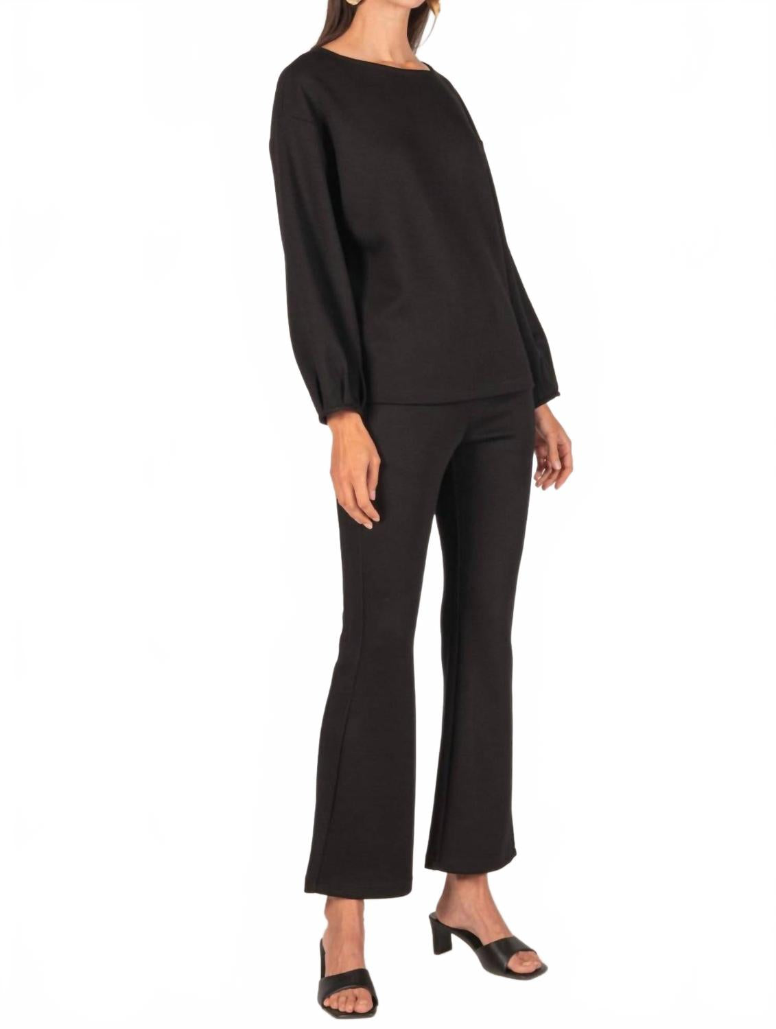 

Черные облегающие расклешенные брюки из масляного модала P.CILL