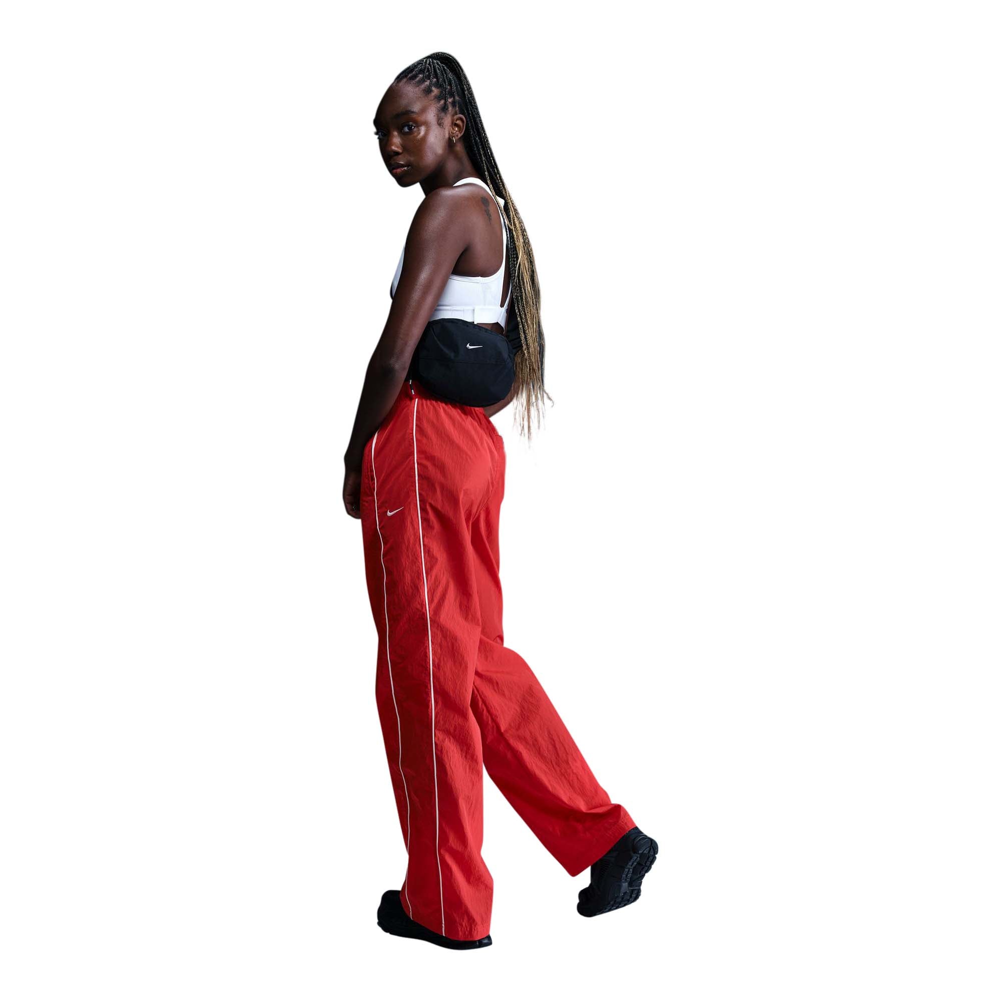 

Женские тканые брюки Nike Windrunner с высокой талией и открытым краем Nike, красный