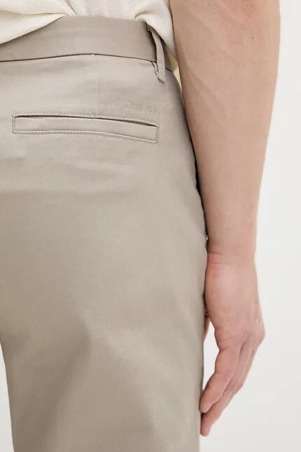 Брюки из хлопка с эластаном Calvin Klein, бежевый — фото 4