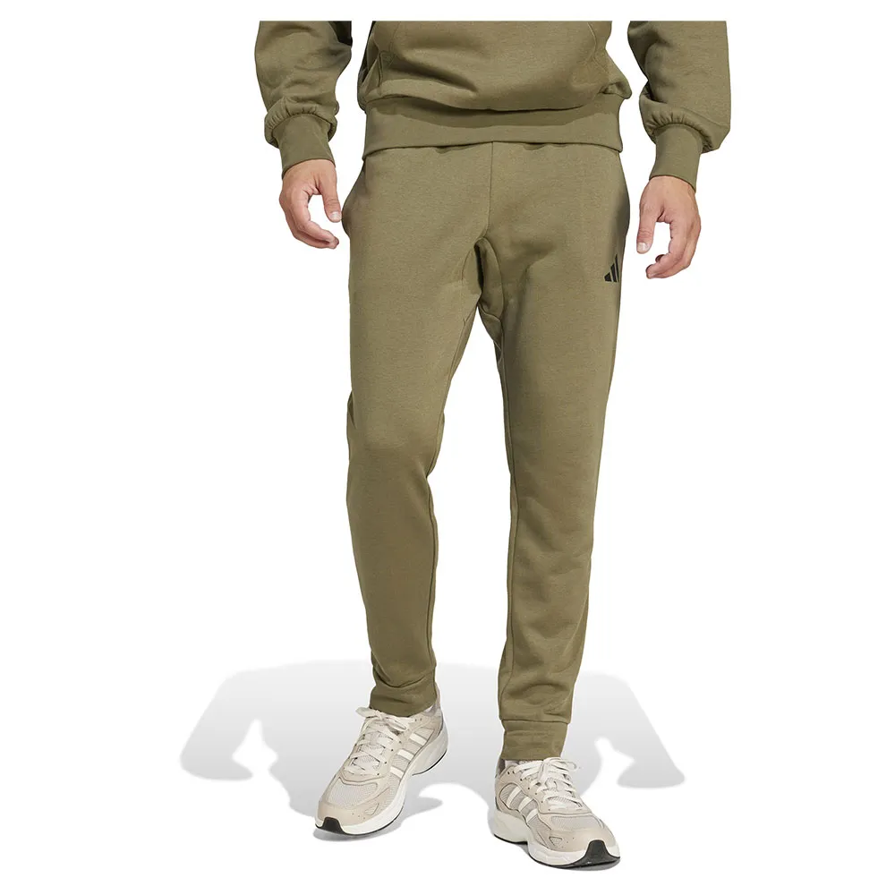 

Джоггеры adidas Essentials Feelcozy Fleece, зеленый
