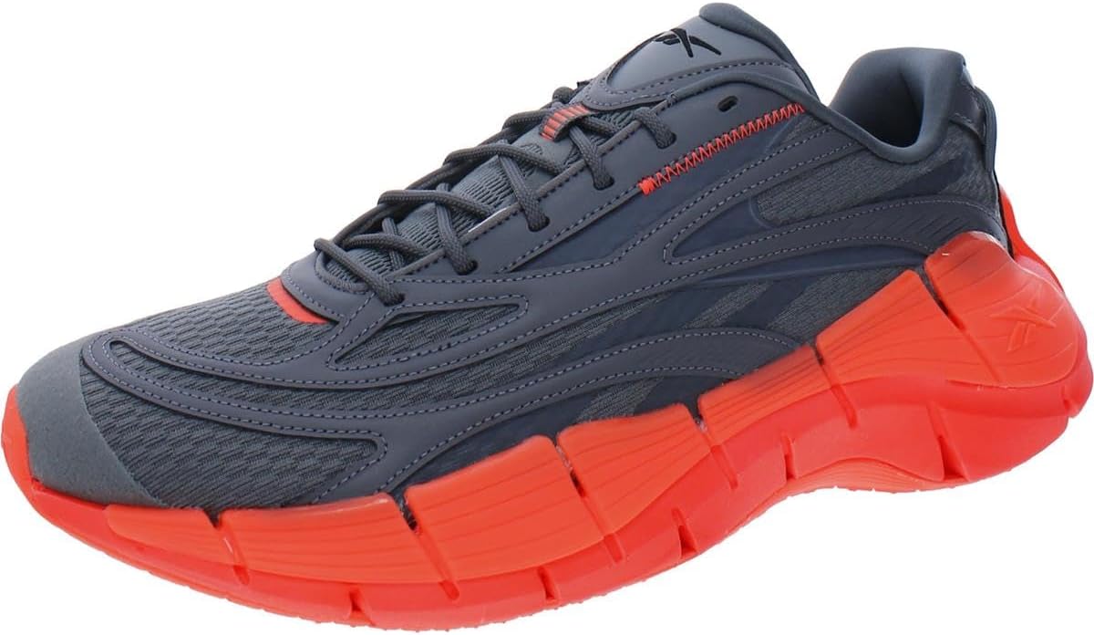 

Reebok Unisex-Adult Zig Kinetica 2.5, серый/оранжевый