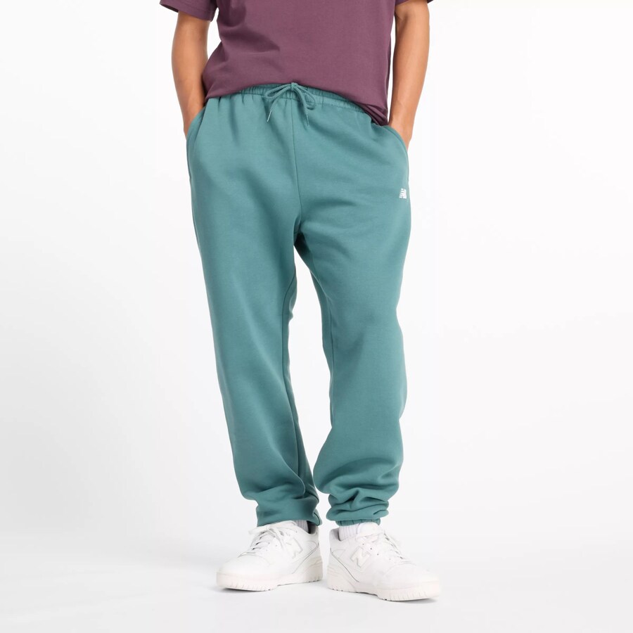 

Зауженные брюки new balance Essentials, зеленый