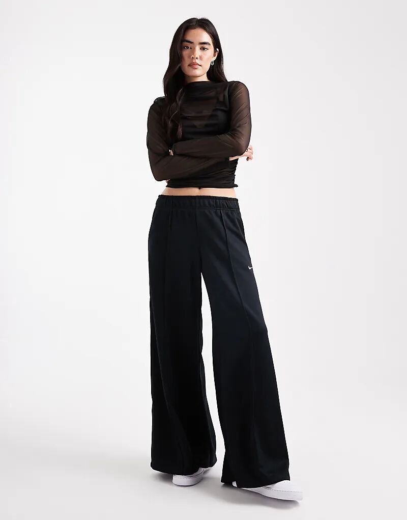 

Широкие спортивные брюки Nike черного цвета