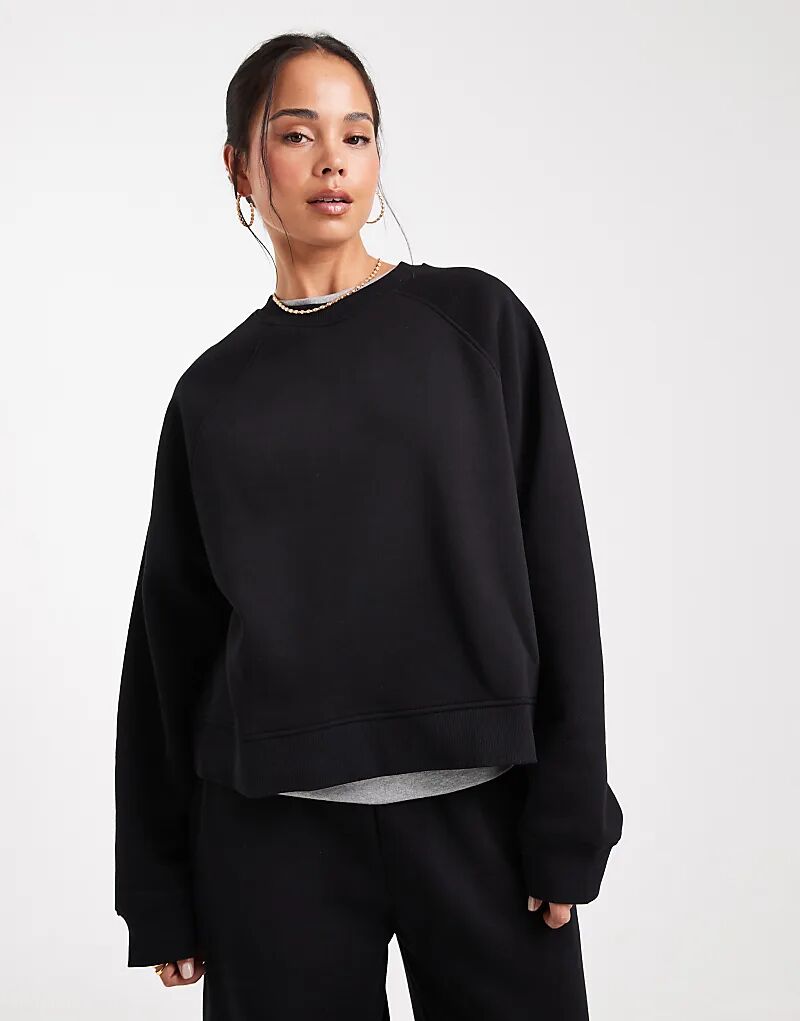 

Толстовка ASOS DESIGN свободного кроя с начесом сзади и регланами черного цвета