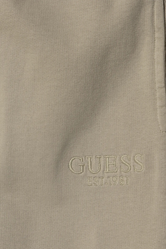 Детские хлопковые спортивные брюки Guess, серый — фото 4