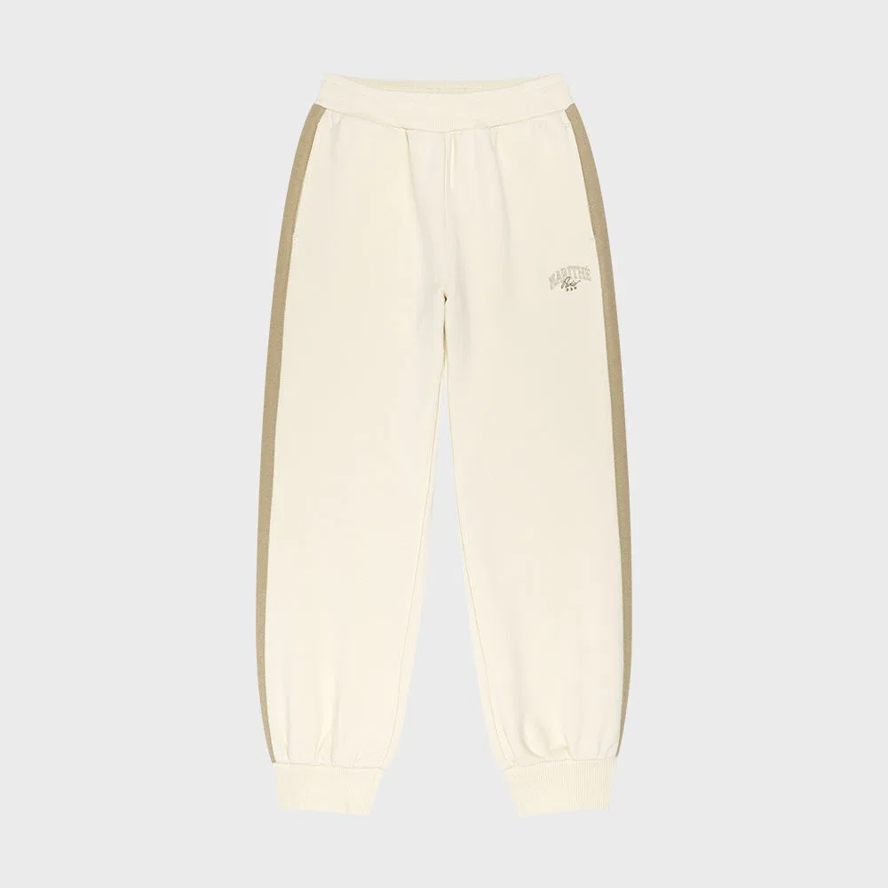 Детские спортивные брюки Side Point цвета айвори от Marithé Kids — фото 2