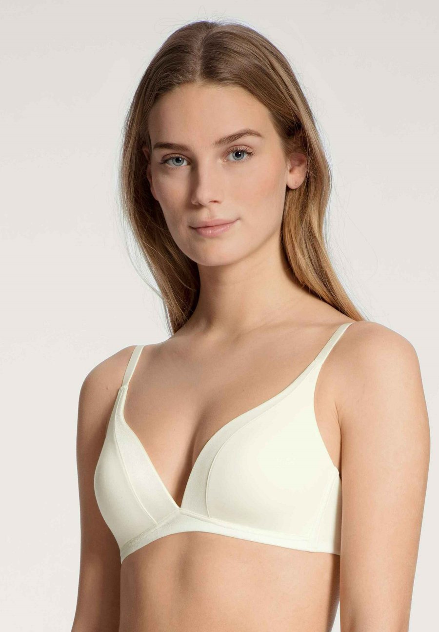 

Бюстгальтер Calida Triangle bra, Alabaster Crème/Light Yellow