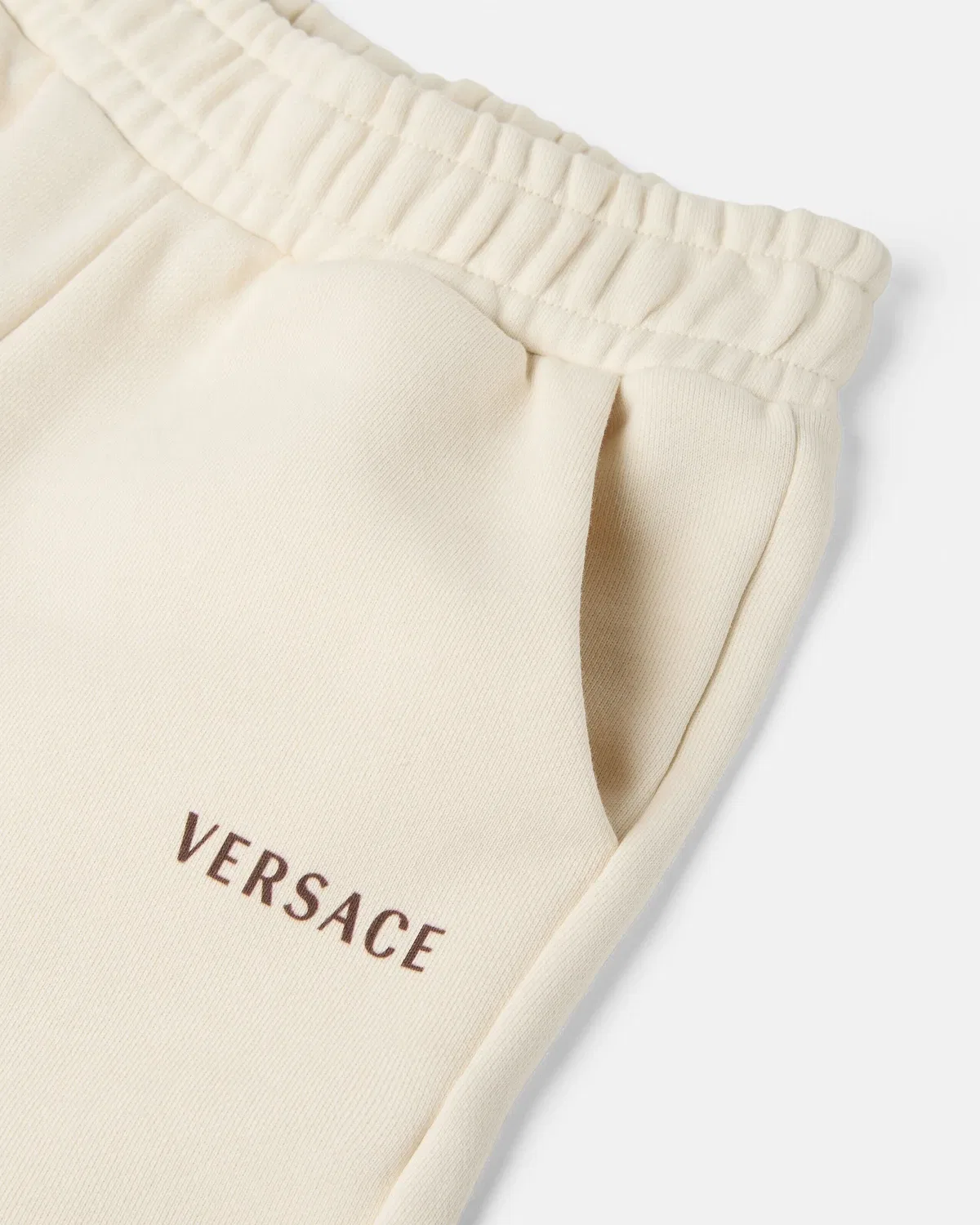 Детские трикотажные спортивные брюки из хлопка с логотипом VERSACE, белый — фото 4