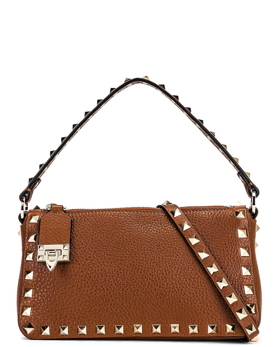 

Сумка через плечо Valentino Garavani Small Rockstud, цвет Selleria