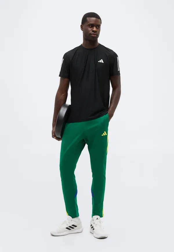 Спортивные штаны Adidas Sportswear House of tiro nations pack, ярко-зеленый/ярко-синий/ярко-желтый — фото 2