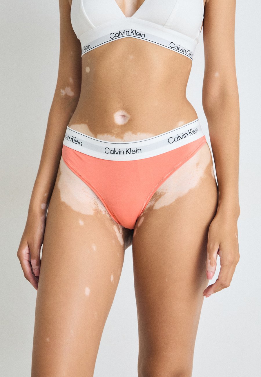 

Трусы Calvin Klein Underwear THONG ICON COTTON MODAL, Coral Pop/Coral