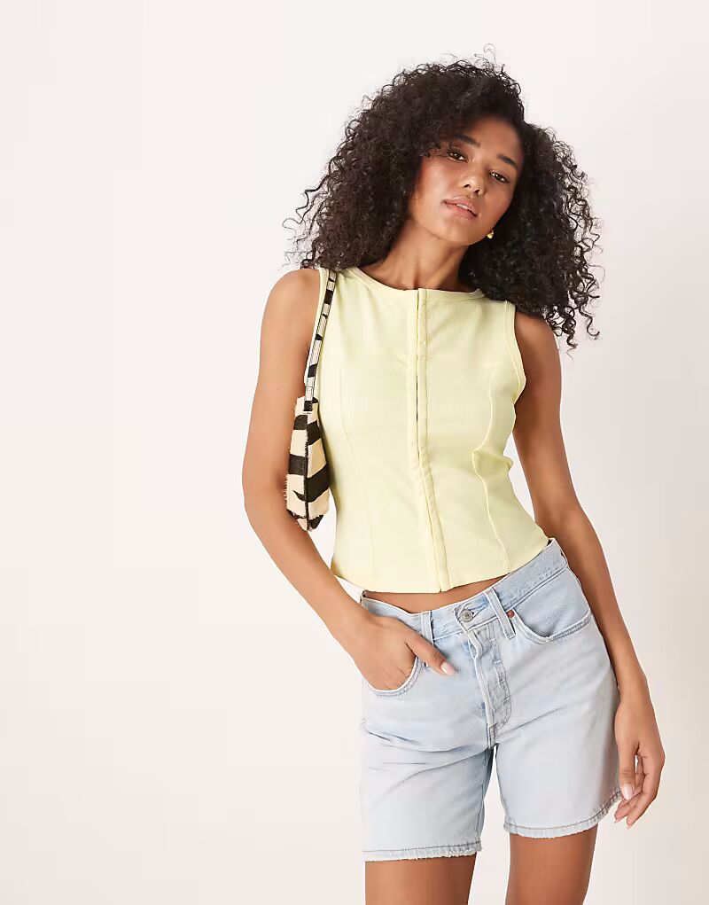 

Топ без рукавов на пуговицах и молока Asos Design, пастельно-желтый