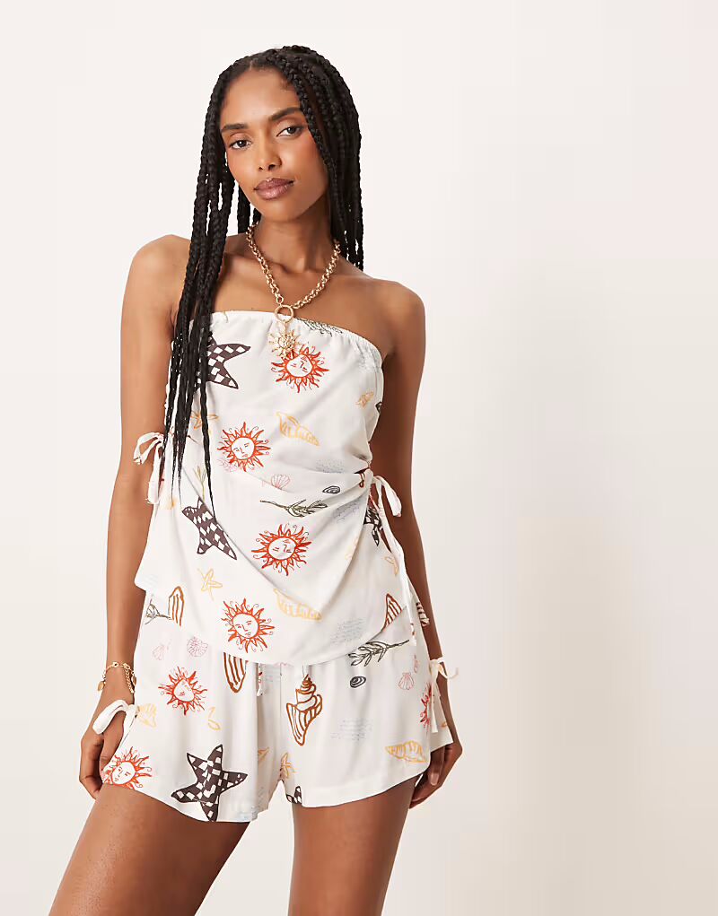 

Топ-бандо из льняной смеси ASOS DESIGN с завязками по бокам и сборками, с праздничным принтом