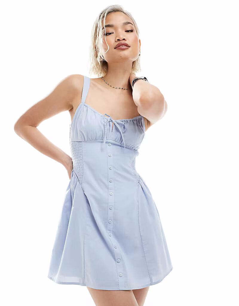 

Мини-платье без рукавов с заниженной талией от Hollister Milkmaid с пуговицами в пыльно-голубом цвете
