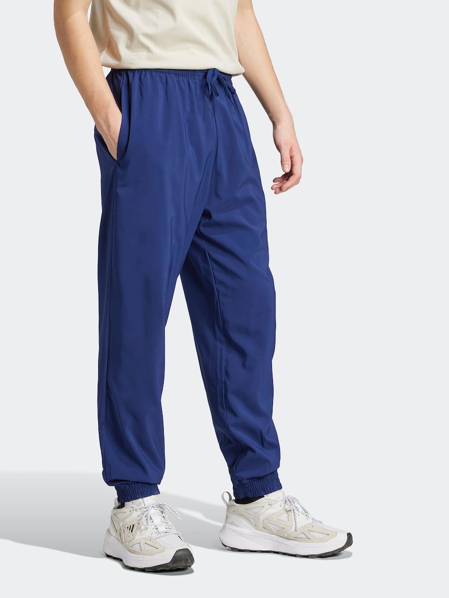 Зауженные спортивные брюки ADIDAS SPORTSWEAR Essentials, темно-синий — фото 2