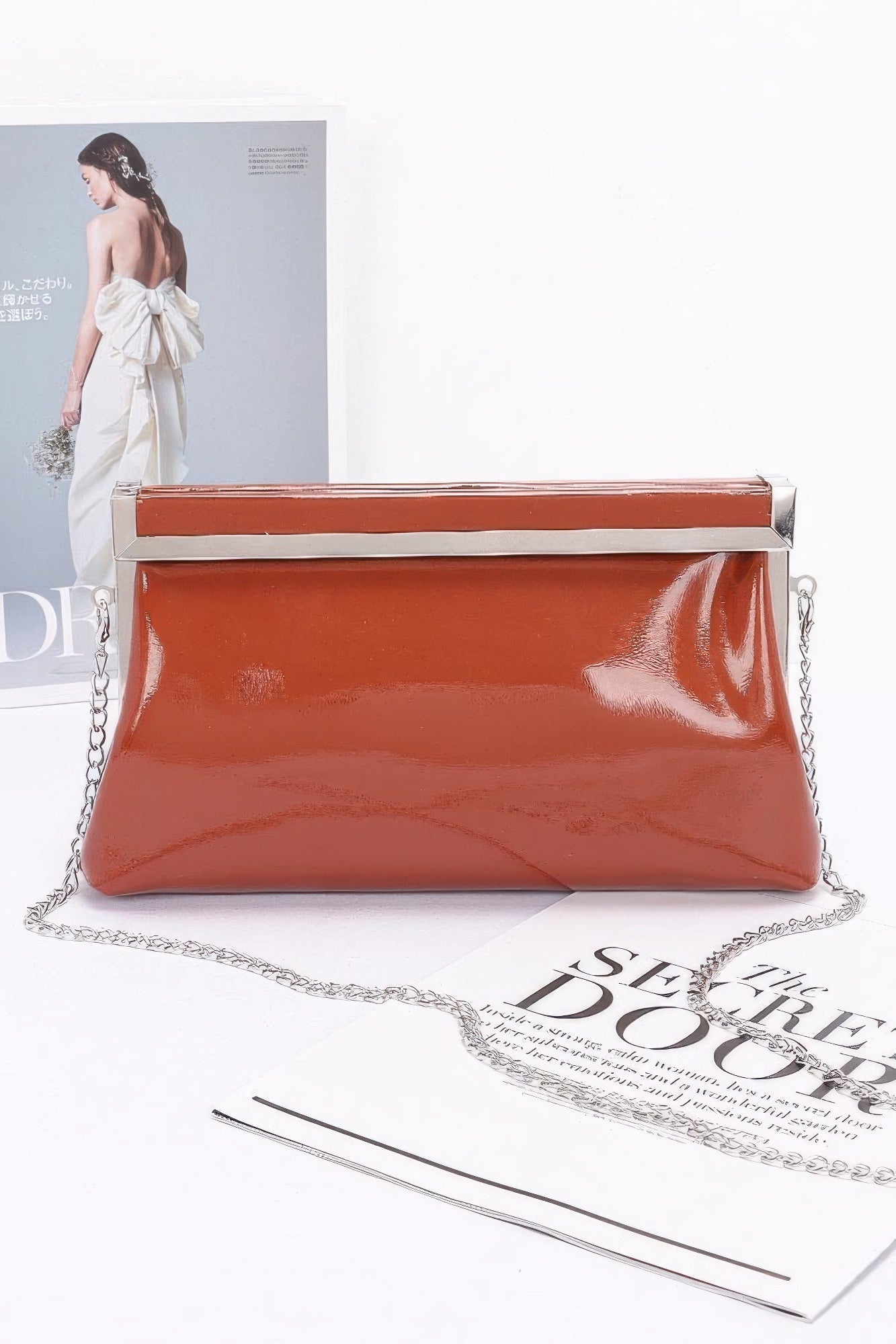 

Женская клатч из лакированной кожи с рамкой FASHNZFAB, коричневый