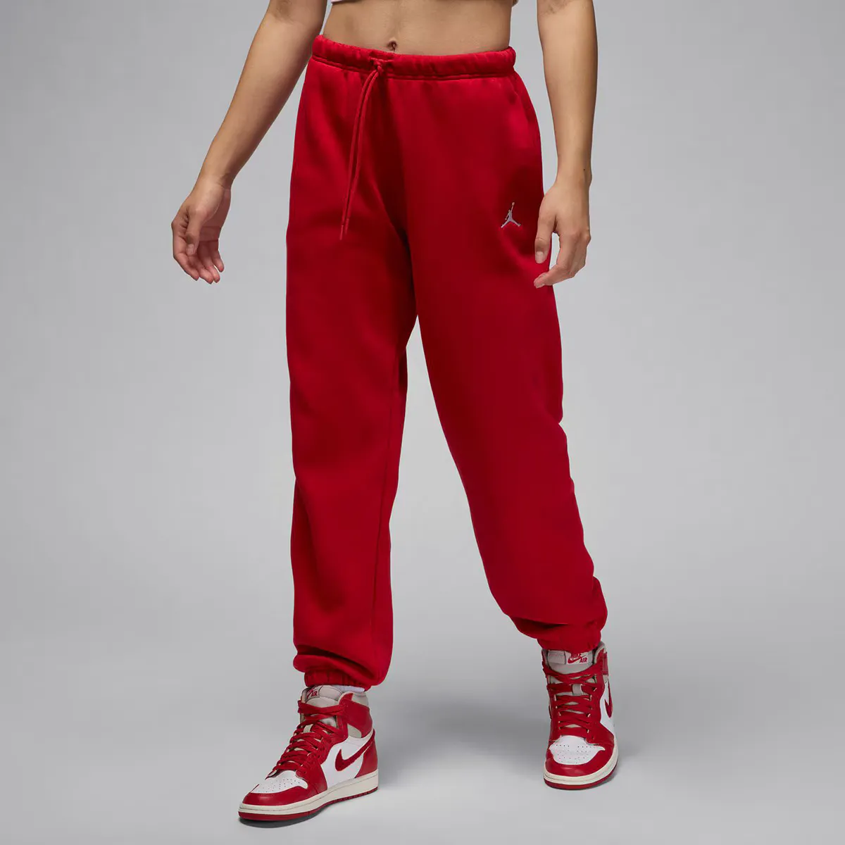 

Женские брюки из флиса Brooklyn Jordan Nike, красный