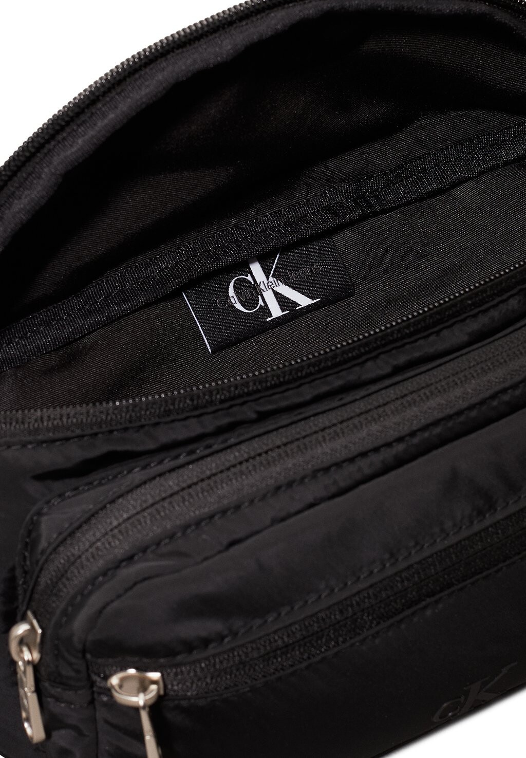 

Поясная сумка OVER Calvin Klein Jeans, черный