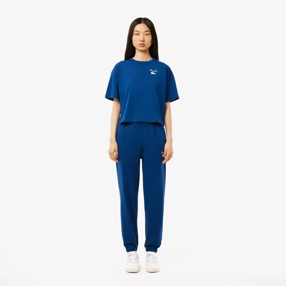 Спортивные брюки Lacoste с графическим акцентом, синие