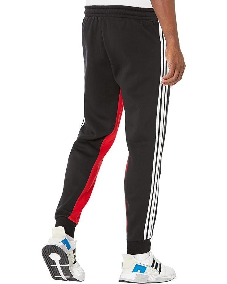 

Брюки Adidas Superstar Fleece Track Pants, цвет Black/Shadow Red