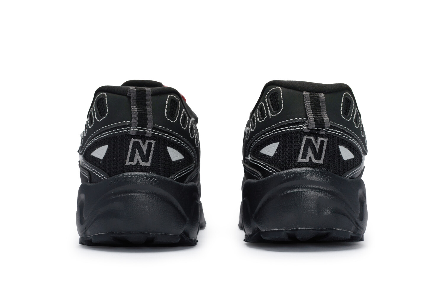 

Кроссовки NB 703 Outdoor Performance, женские, низкие, цвет черный/темный обсидиан/оранжевый New Balance