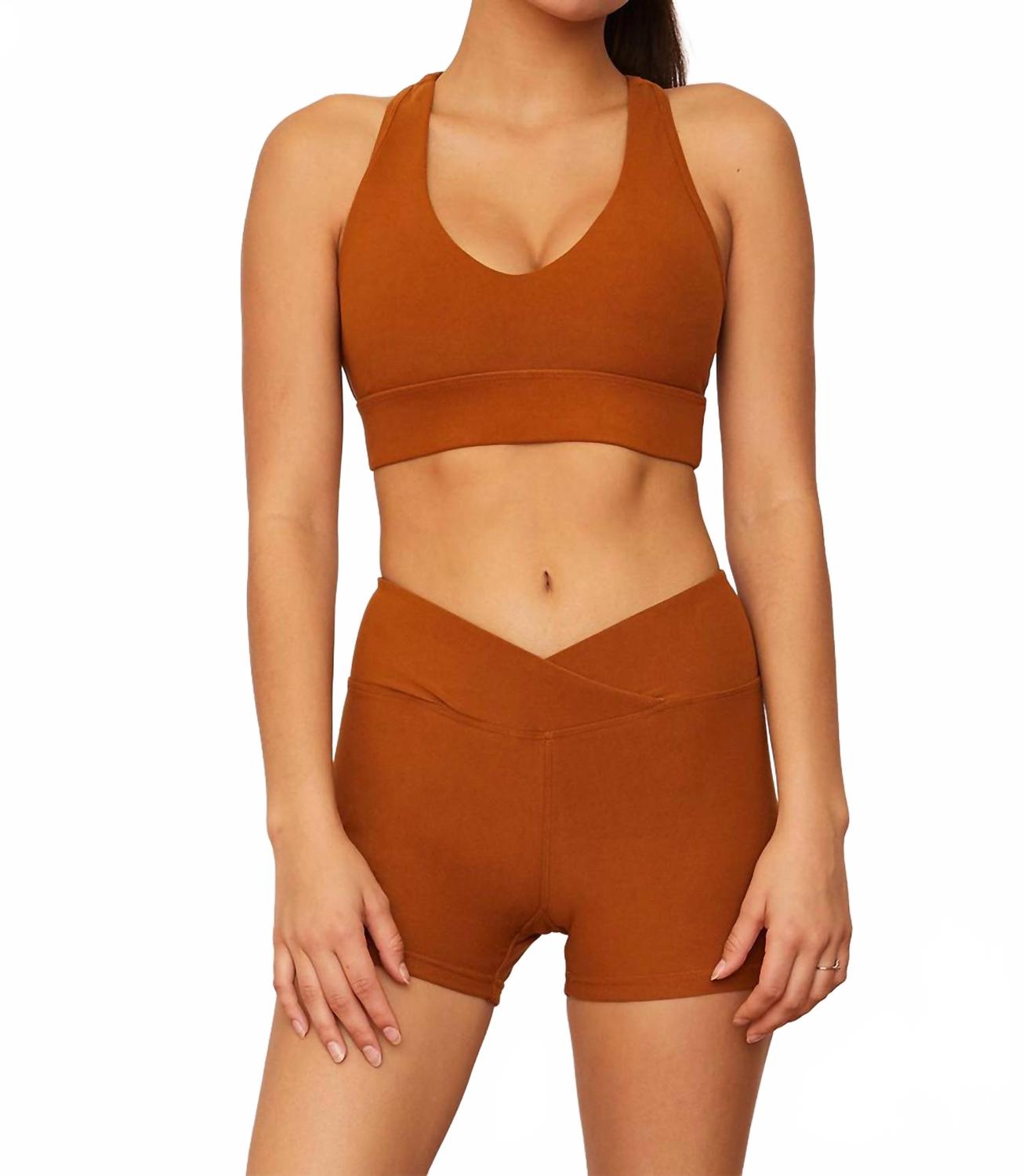 

Веганский замшевый активный бра-топ с ракербэком в цвете куркумы WOLVEN, Turmeric