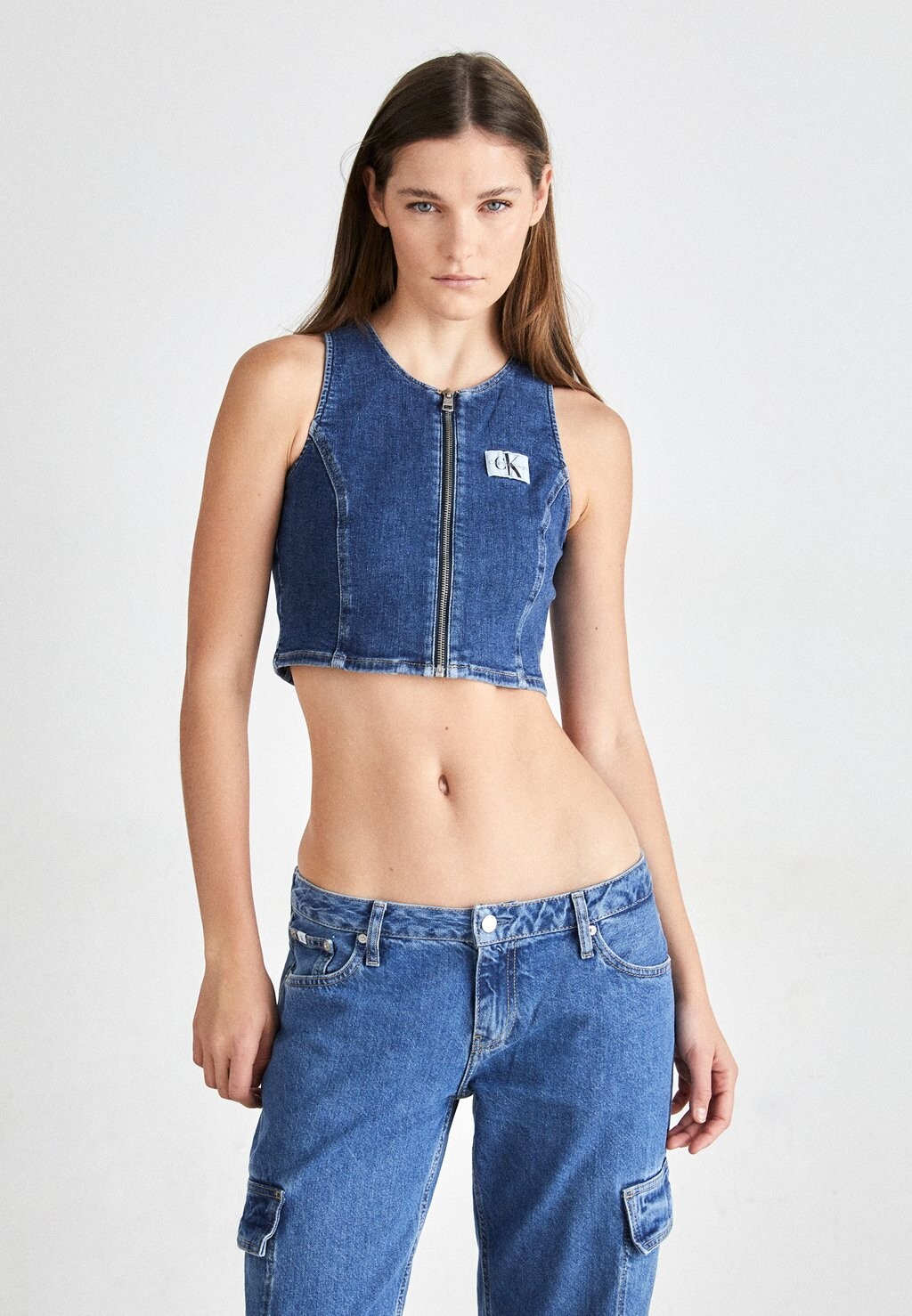 

Блузка Zip Crop Calvin Klein, джинсовая темная