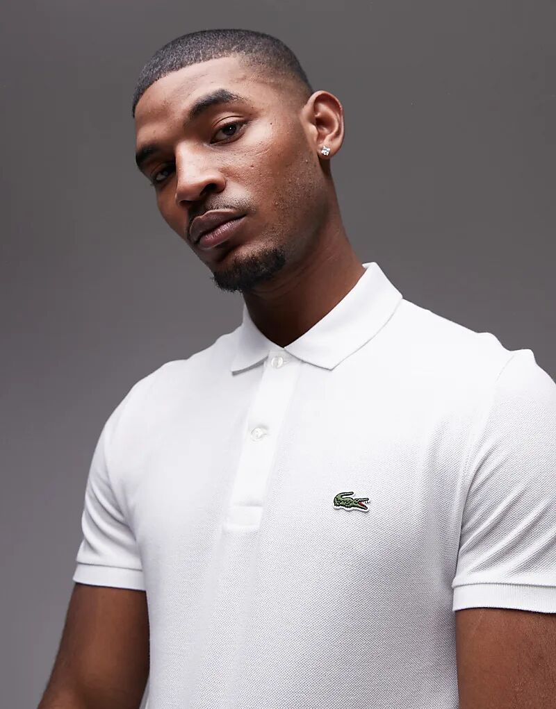 

Поло из пике облегающего кроя белого цвета Lacoste