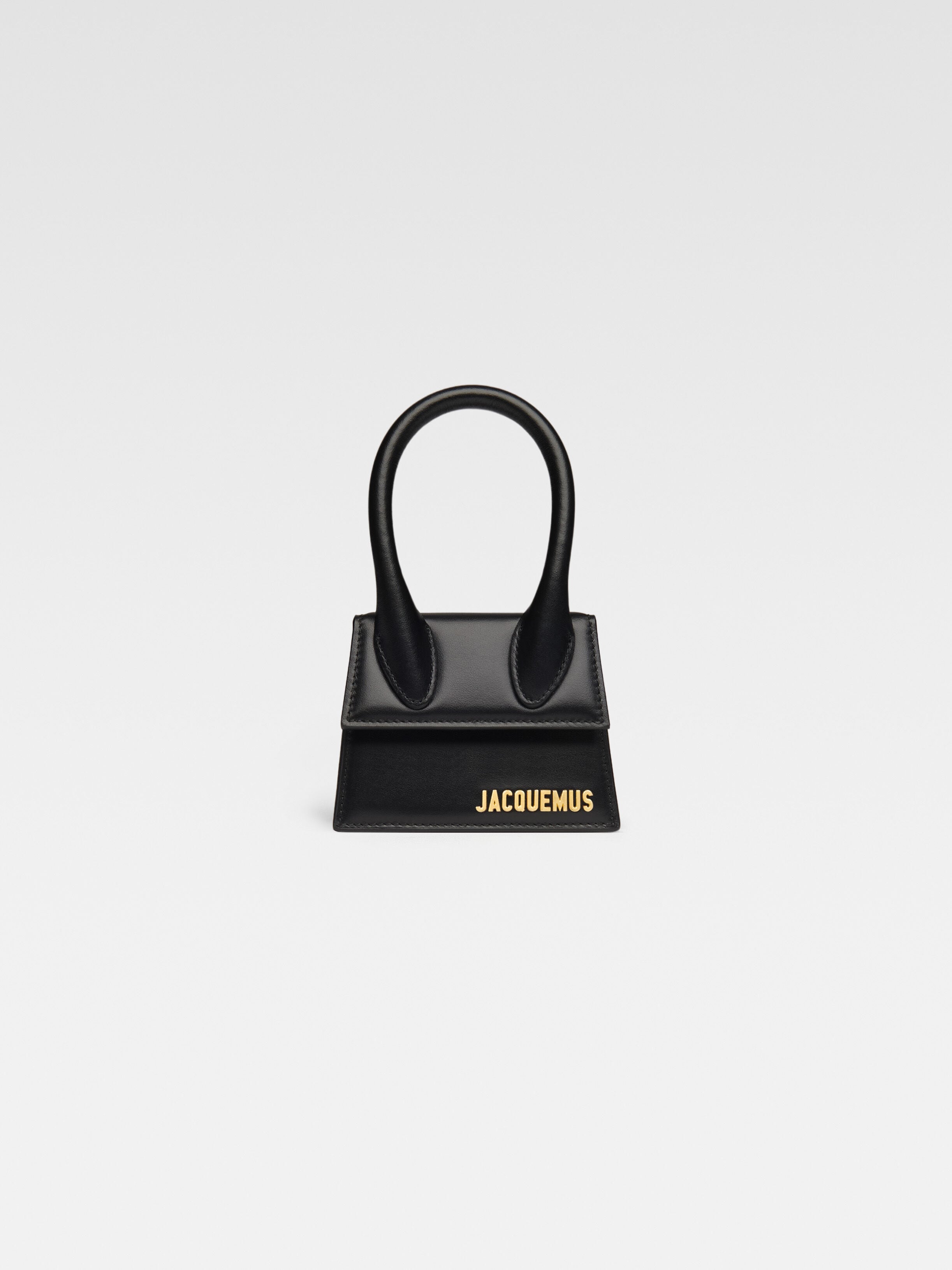 

Фирменная кожаная мини-сумочка JACQUEMUS The Chiquito, черный