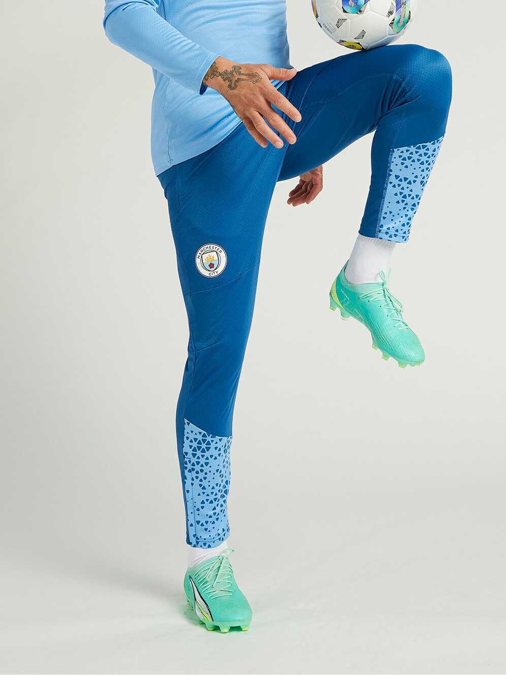 

Спортивные брюки Puma MCFC Training Pants, синий