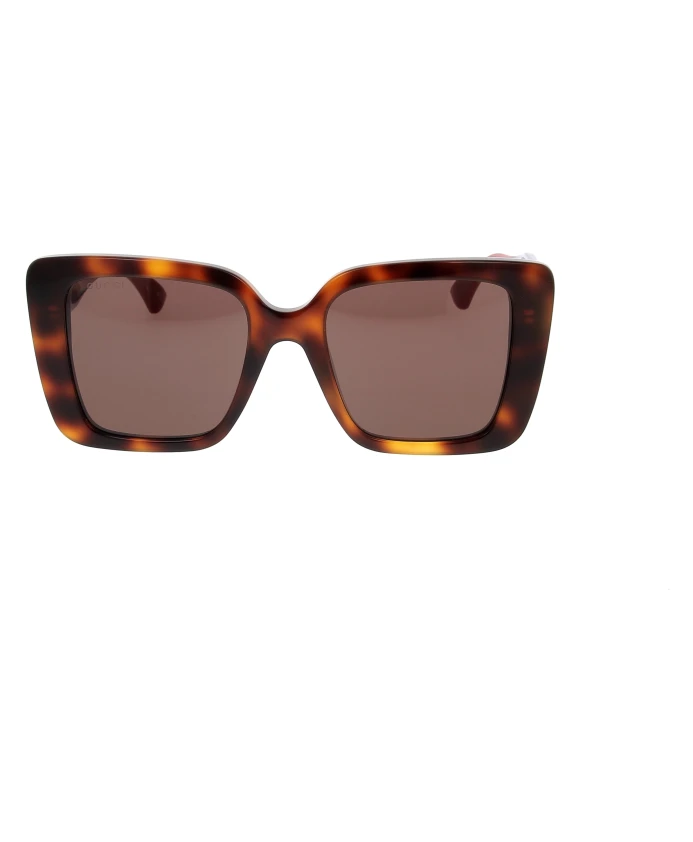 

Стильные солнцезащитные очки для людей, следящих за модой. Gucci, коричневый