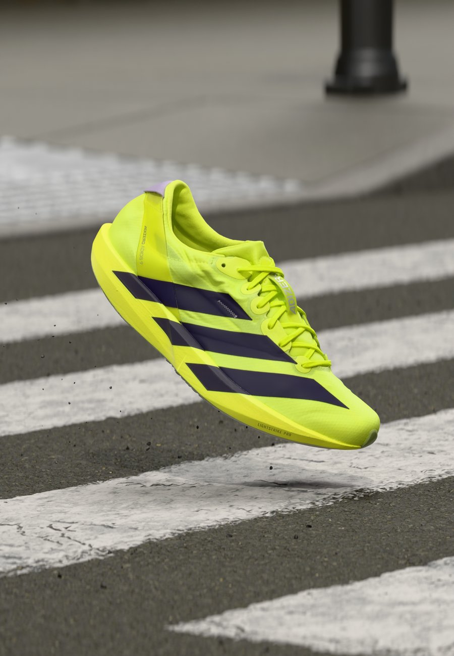 

Кроссовки Adidas Performance ADIZERO ADIOS 9 M, Solar Yellow/Aurora Plum/Powder Plum/Yellow