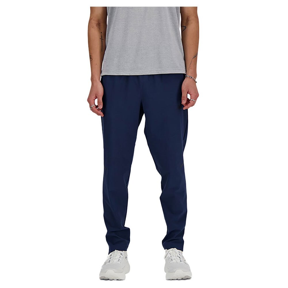 

Брюки New Balance Tenacity Stretch Tracksuit, синий