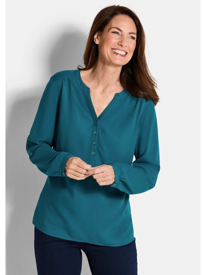 

Туника Элегантная вискозная блузка с V-образным вырезом в цвете петролеум. GOLDNER