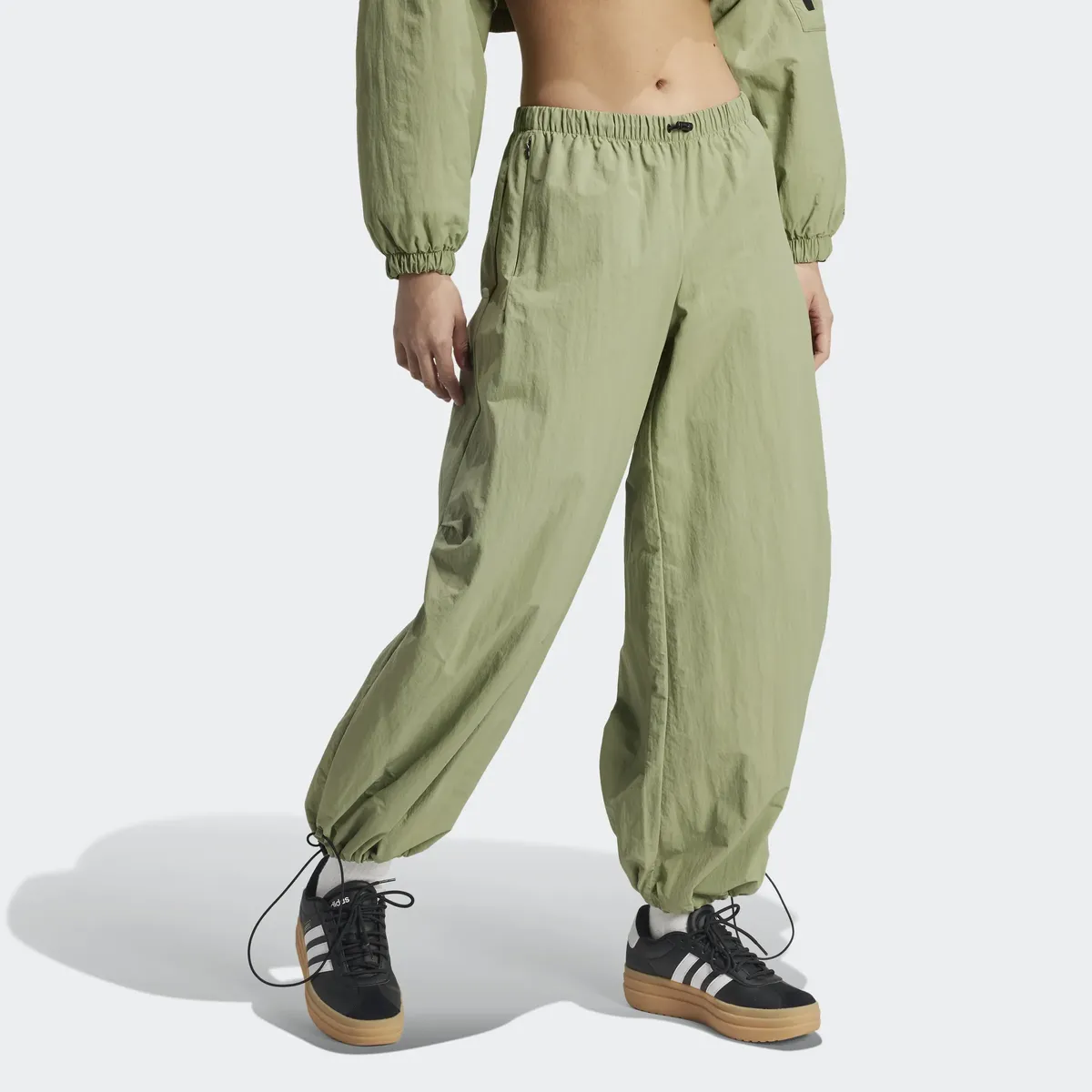 

Спортивные брюки Adidas Sportswear "W CE PARA PT" (1 шт.), зеленый