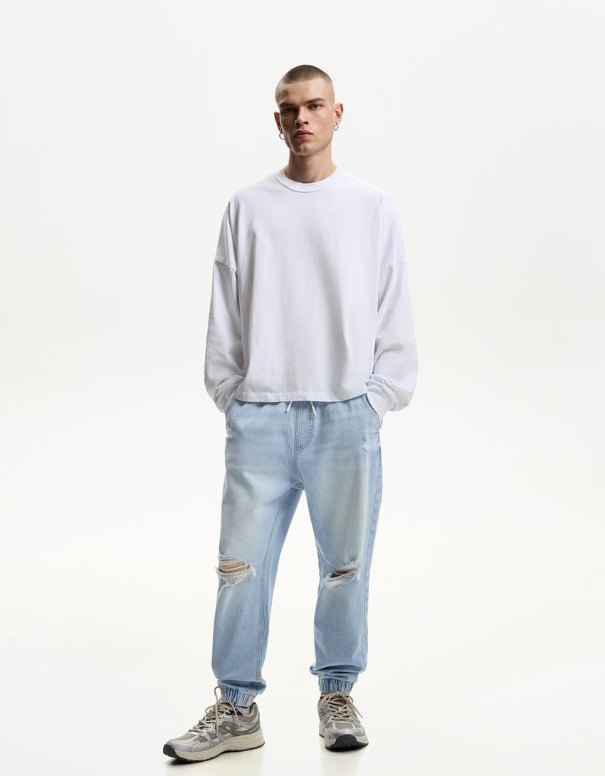 

Рваные джинсы-джоггеры Bershka, голубой