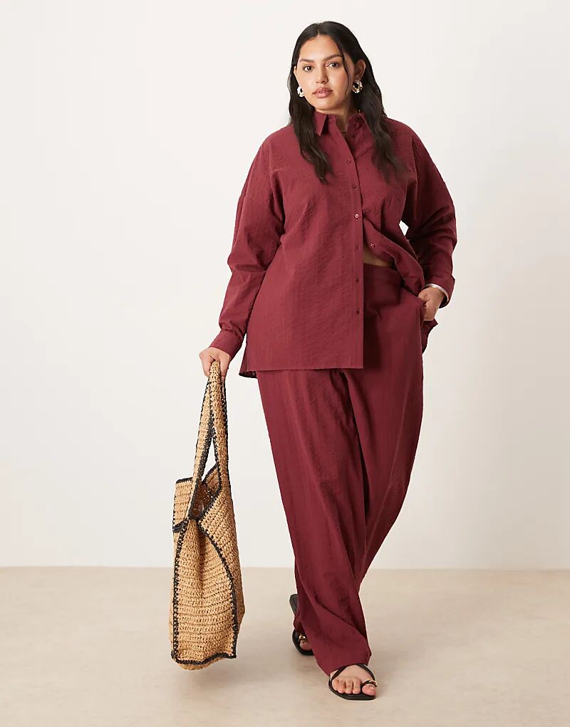 

Свободные брюки-клеш из сирсакера ASOS DESIGN Curve бордового цвета