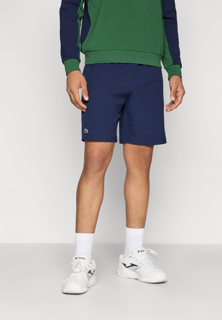

Спортивные шорты Lacoste Sport TENNIS SHORT TOUR, Navy Blue/Dark Blue